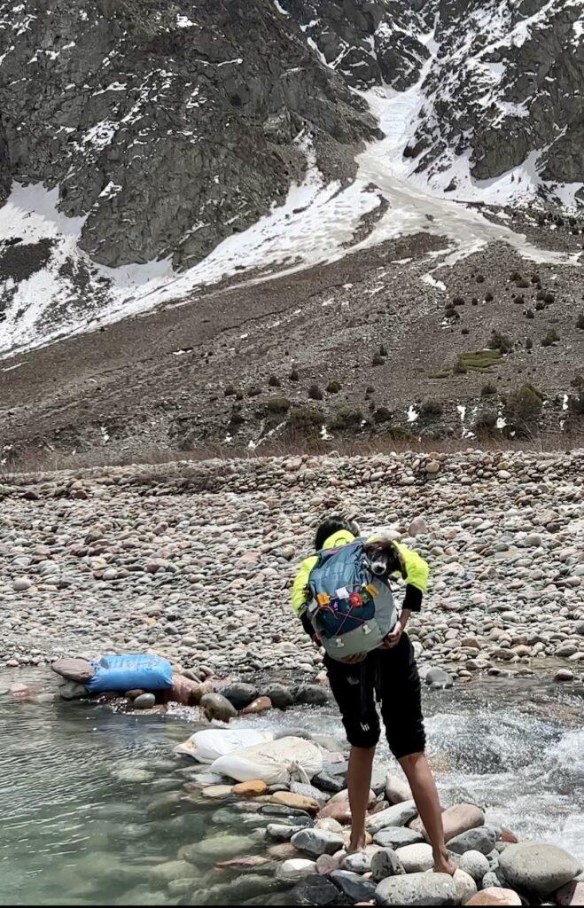 Surabhi and Joey crossing river in Jispa